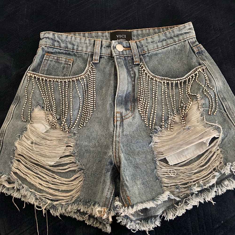 VICI Light Blue Distressed Denim Shorts with Rhinestone Fringe